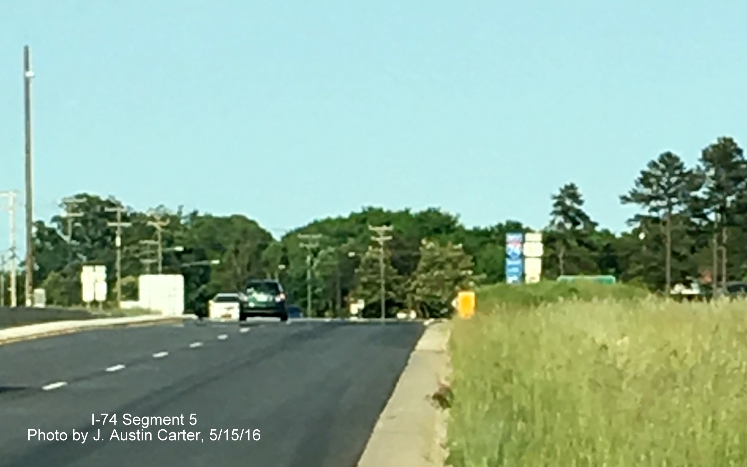 Image of I-74 and US 311 trailblazers at newly reconfigured Union Cross Rd interchange, from J. Austin Carter