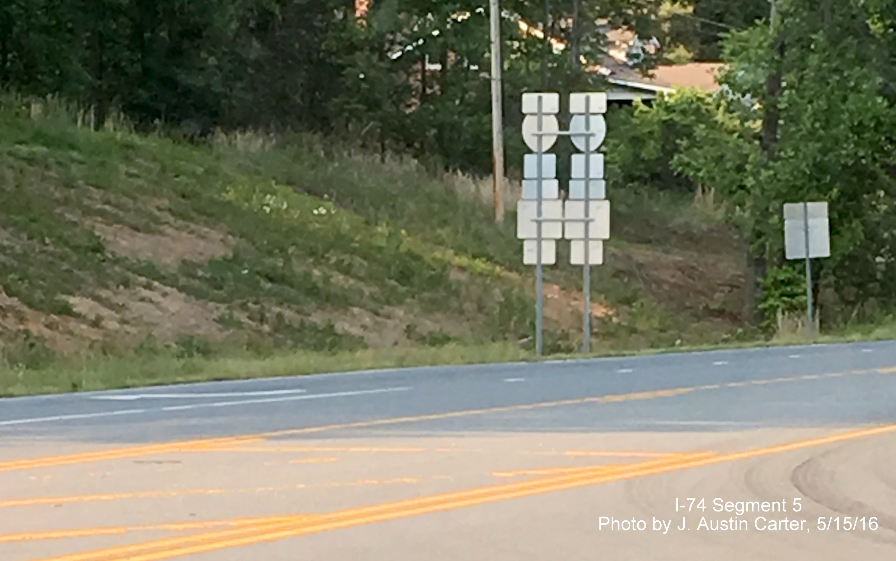 Image of back of I-74 and US 311 trailblazers at interchange with Ridgewood Road in Forsyth County, from J. Austin Carter