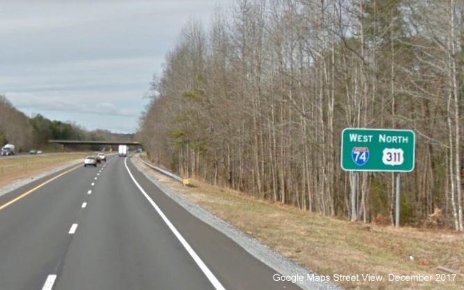 Image of West I-74/North US 311 reassurance marker sign following NC 66 Kernersville exit, 
        Google Maps Street View image taken in January 2017