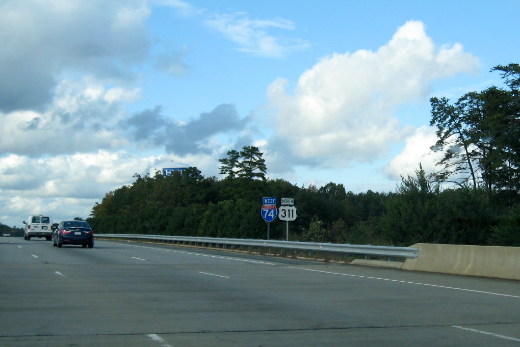 Photo of I-74 and US 311 shields along the East Belt Freeway near Kivett Dr 
in Oct. 2011