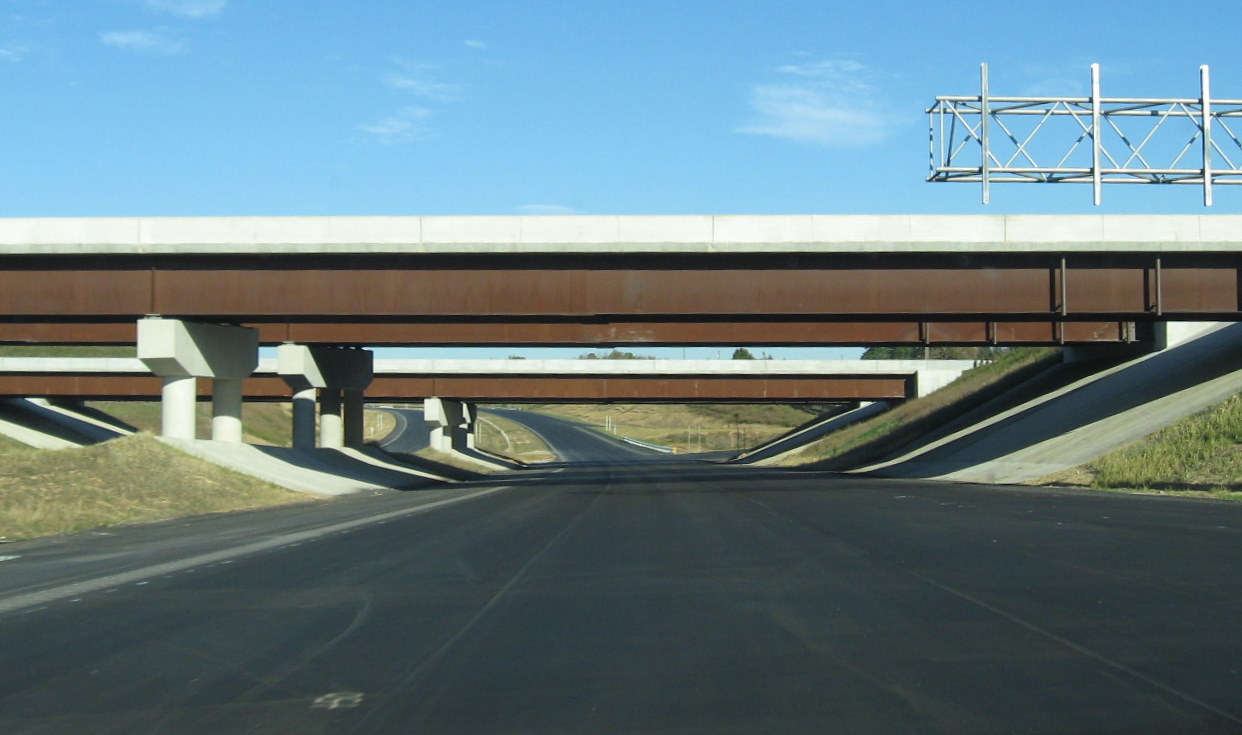 Photo taken traveling under the I-85 bridge along the unopened I-74 
freeway in Oct. 2010