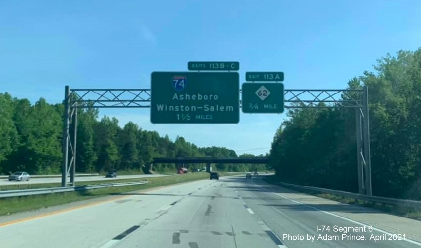 Image of 1 1/2 miles advance sign for I-74 exits without US 311 shield after decommissioning on I-85 
                                               North in High Point, by Adam Prince, April 2021