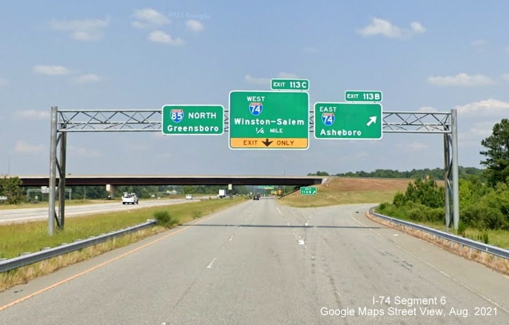 Overhead signage on C/D ramp from I-85 North with US 311 shields removed, Google Maps Street View 
        image, August 2021