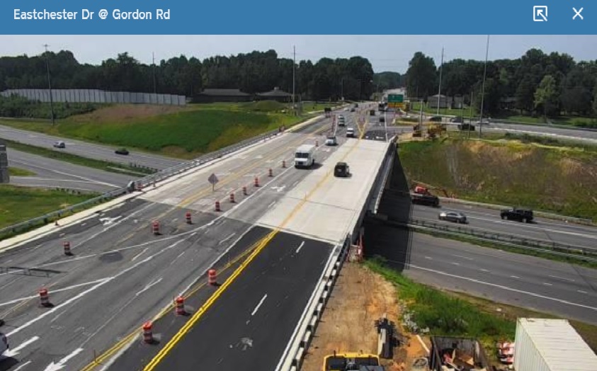 NCDOT traffic camera image showing new westbound section of future US 70 bridge over I-74 in 
                                                High Point open to traffic, August 2021