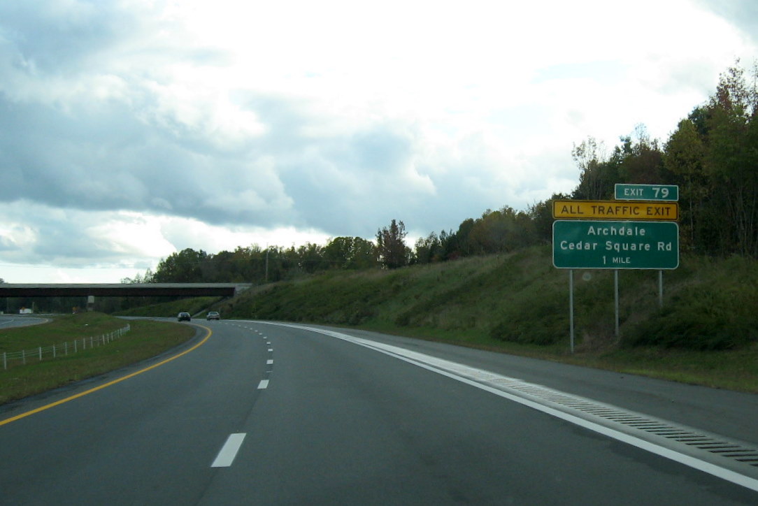 Photo of first exit sign on new portion of I-74 East freeway for the Cedar 
Square Road interchange near Glenola in October 2011