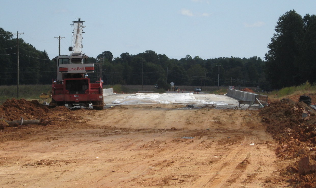 Photo of progress constructing US 311 bridge over future I-74 freeway in 
Sophia, Oct. 2010