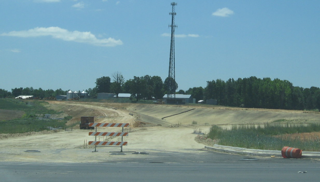 Photo of progress in creating the I-74 west off-ramp to Cedar Square Road in
May 2010