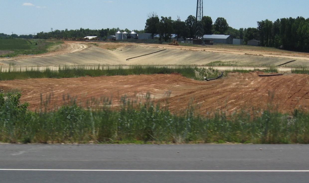 Photo of construction progress in building the westbound I-74 on-ramp from 
Cedar Square Road, May 2010