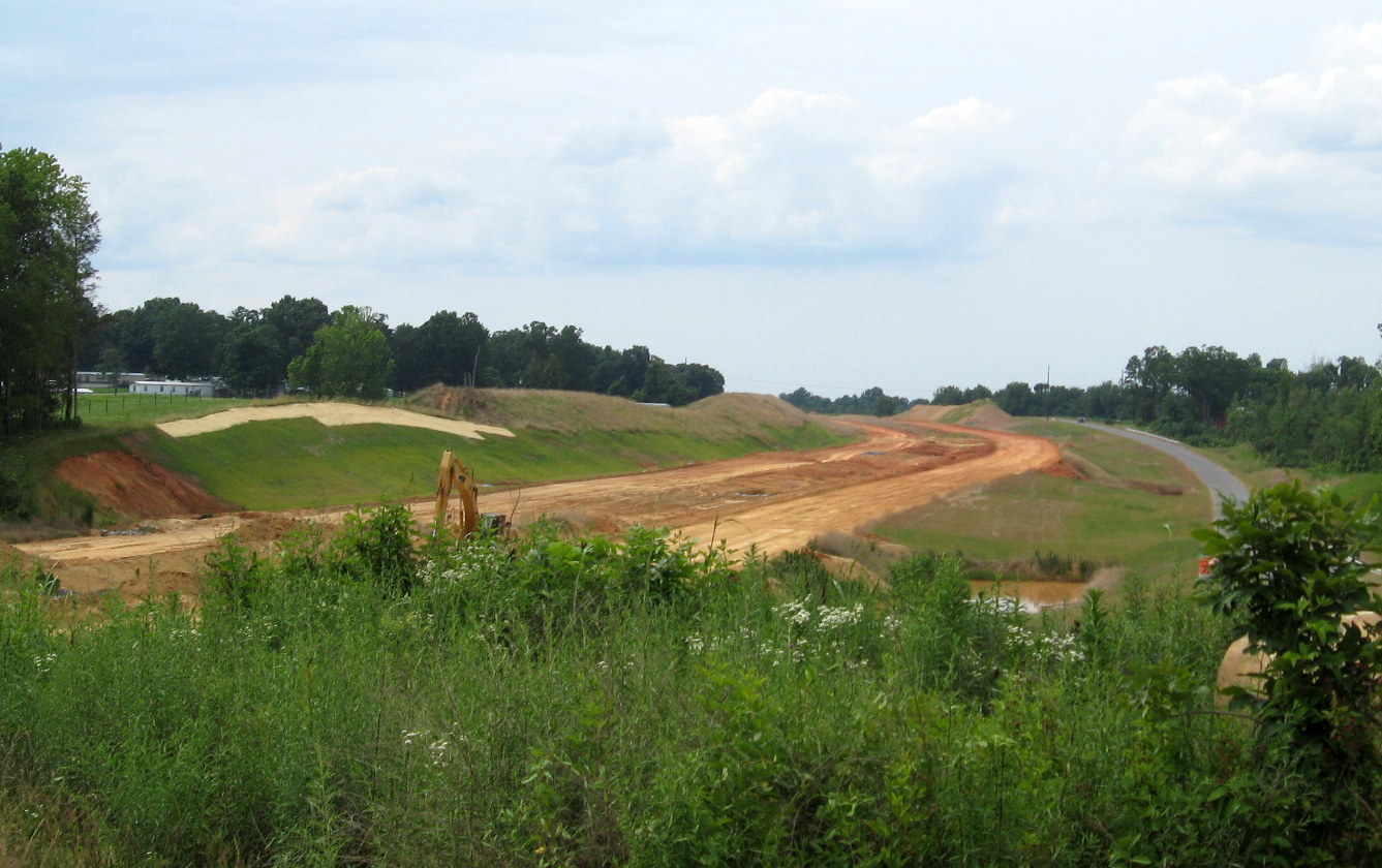 Photo of grading progress around Branson Davis Rd Bridge in June 2012