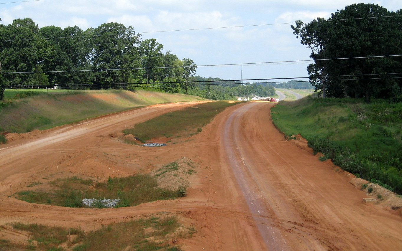 Photo of view looking north from Banner Whitehead Rd Bridge showing progress 
in building I-74 freeway ifn Aug. 2012