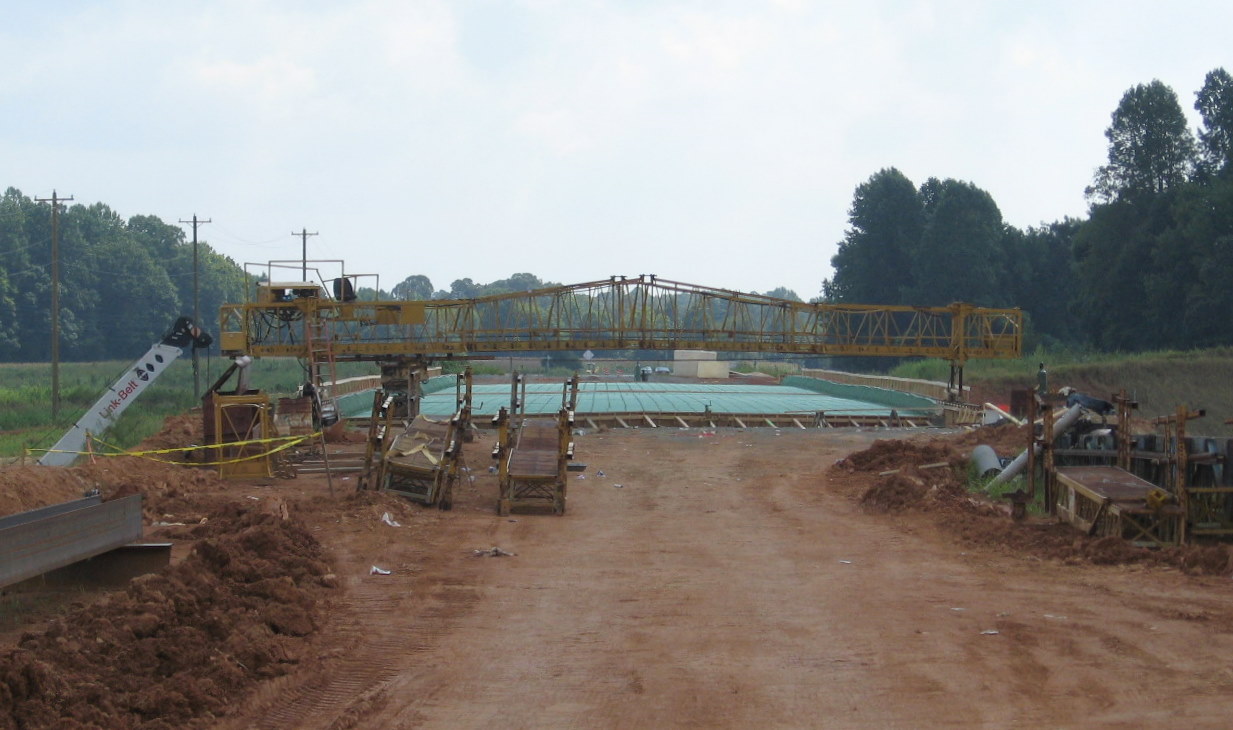 Photo of progress constructing US 311 bridge over future I-74 freeway in 
Sophia, Aug. 2010