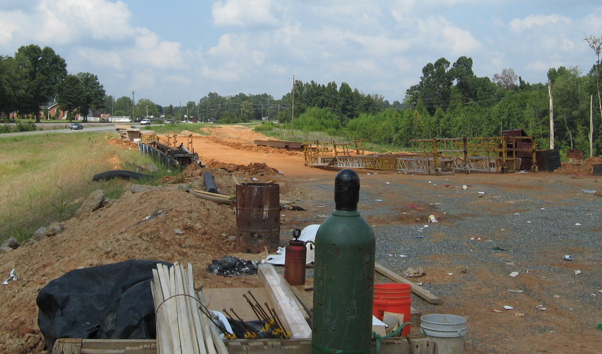 Photo of progress constructing US 311 bridge over future I-74 freeway in 
Sophia, Aug. 2010