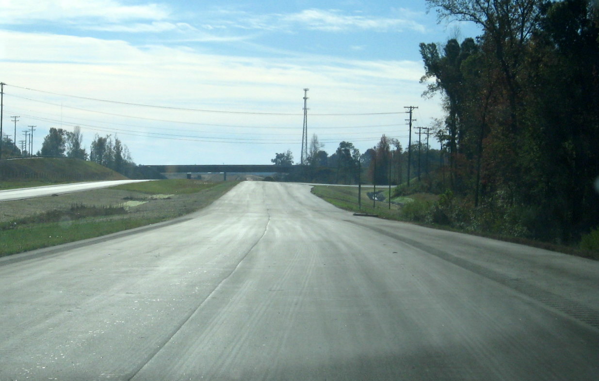 Photo of Cedar Square Exit Ramp near Glenola from unopened I-74 East 
freeway in Oct. 2010