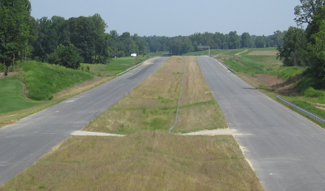 Photo of view north along under construction I-74 freeway in July 2010