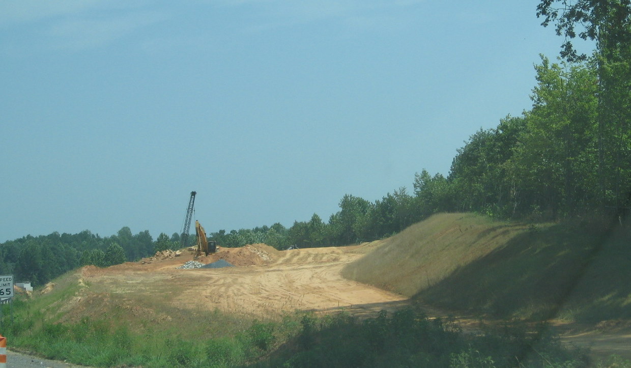 Photo of progress building future I-74 ramp bridges from US 220 North in 
Randleman, July 2010