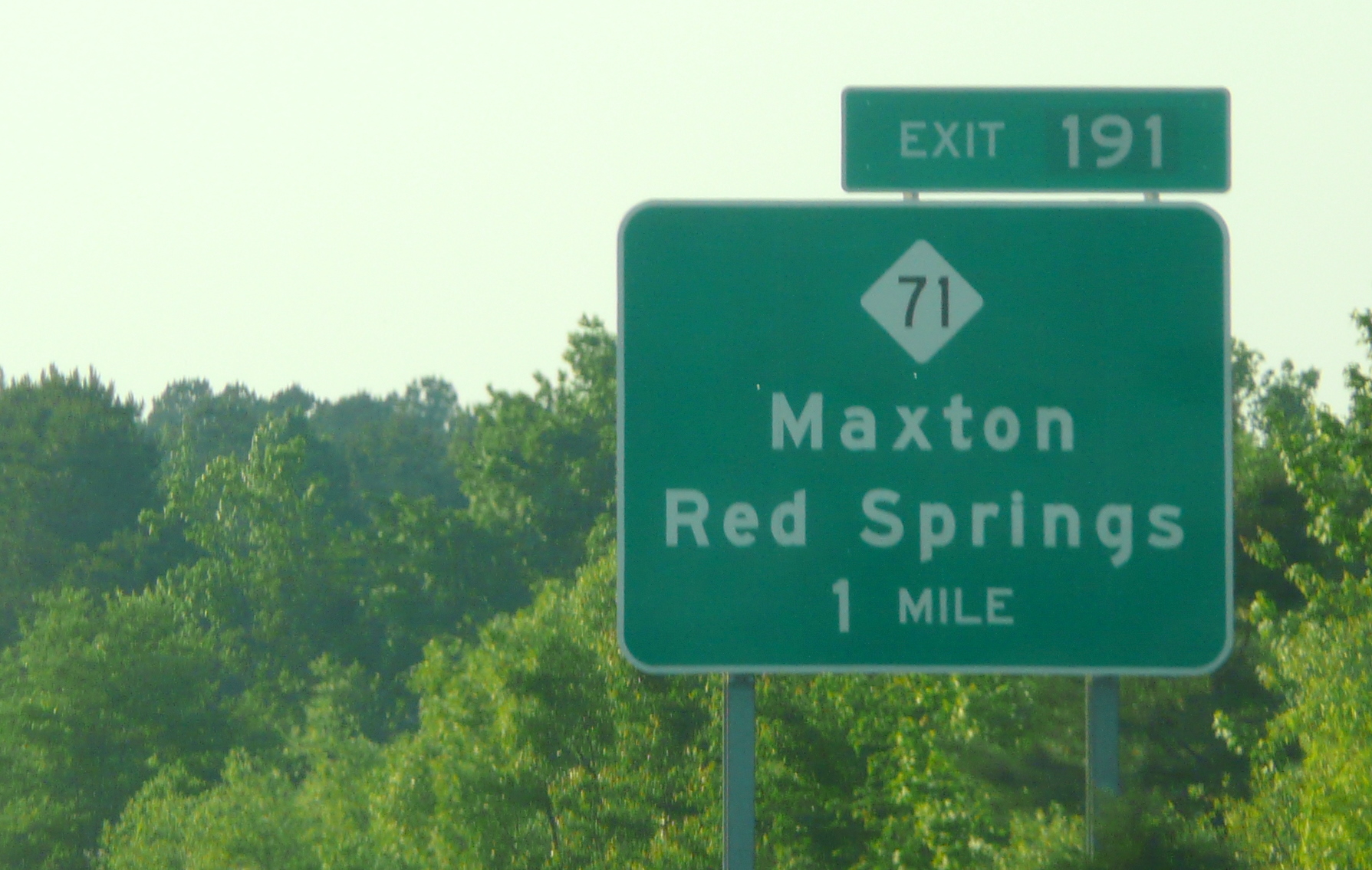 Photo of exit signage for NC 71 on West US 74, courtesy of Jim Mast in May 
2009