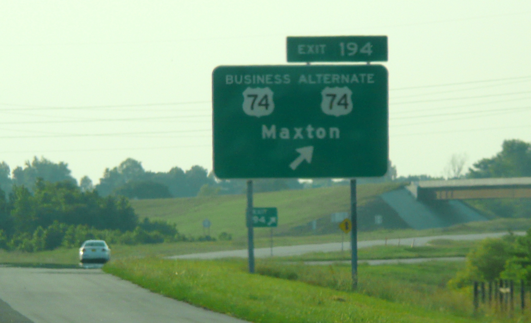 Photo of the signage at the Alt US 74/Bus. US 74 interchange near Alma in May 
2009, courtesy of James Mast