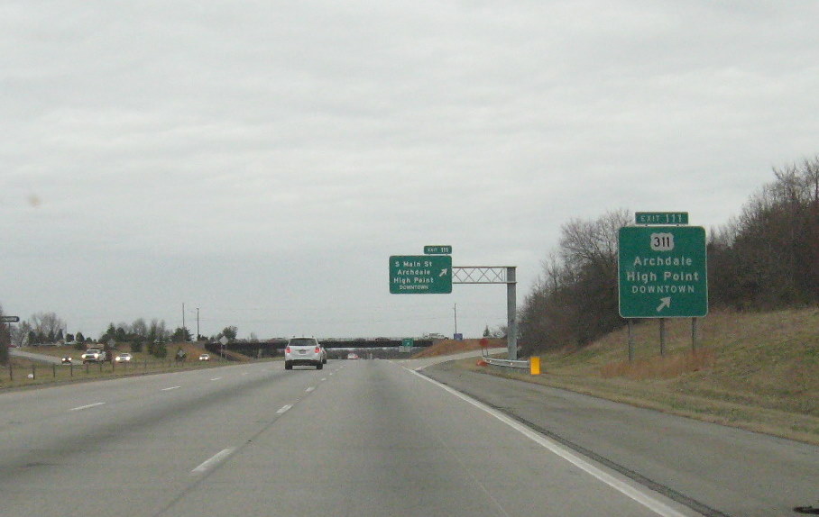 Photo of new exit sign at would become former US 311 exit 2 mile south of 
new interchange with I-74/US 311 in March 2010