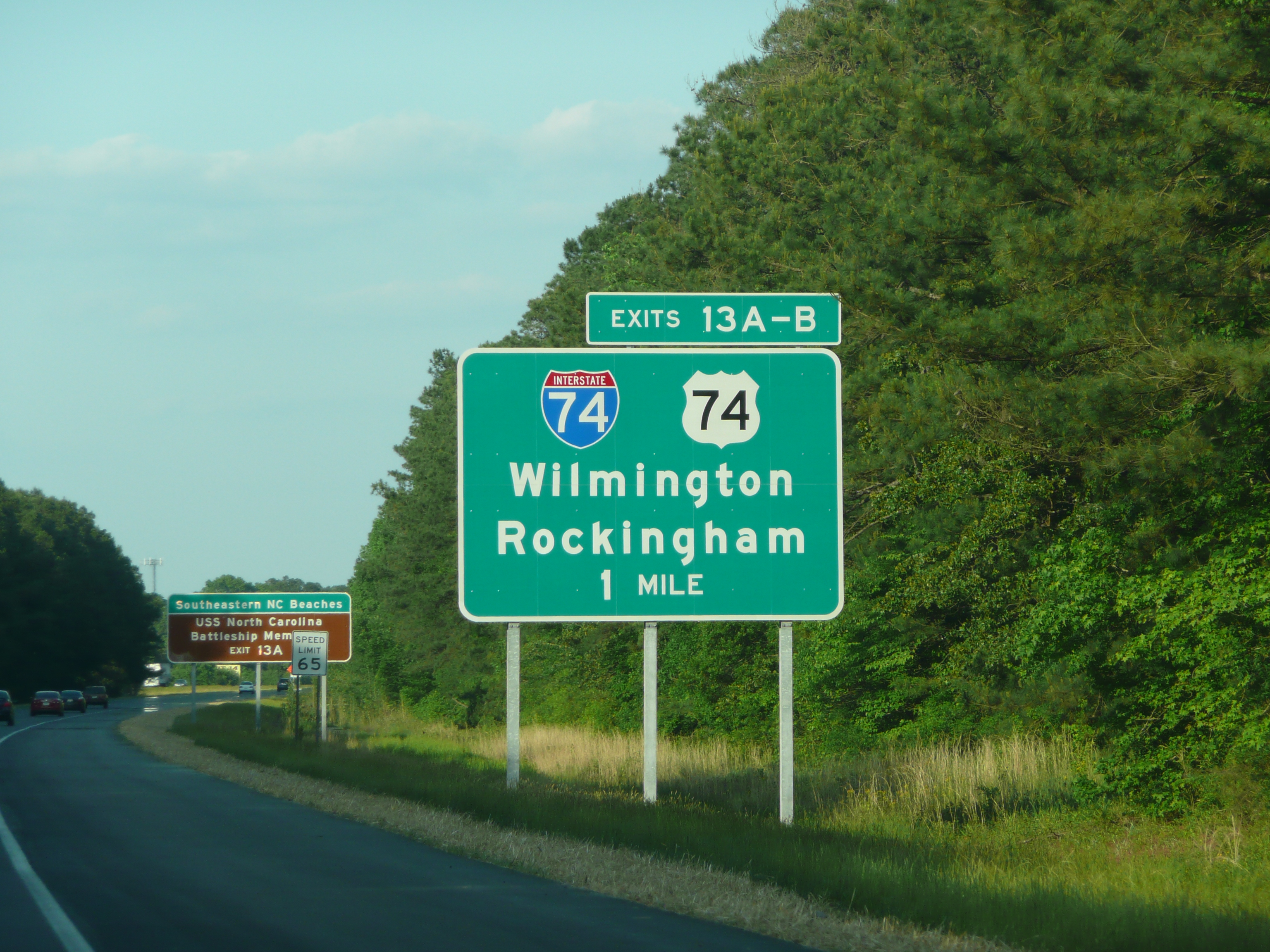 Photo of the 1 mile I-74/US 74 exit sign on I-95 South near Lumberton in May 
2009