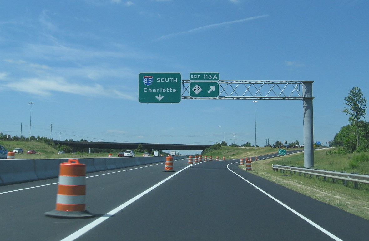 Photo of new exit signage for I-74 and NC 62 interchange on I-85 South in 
May 2010