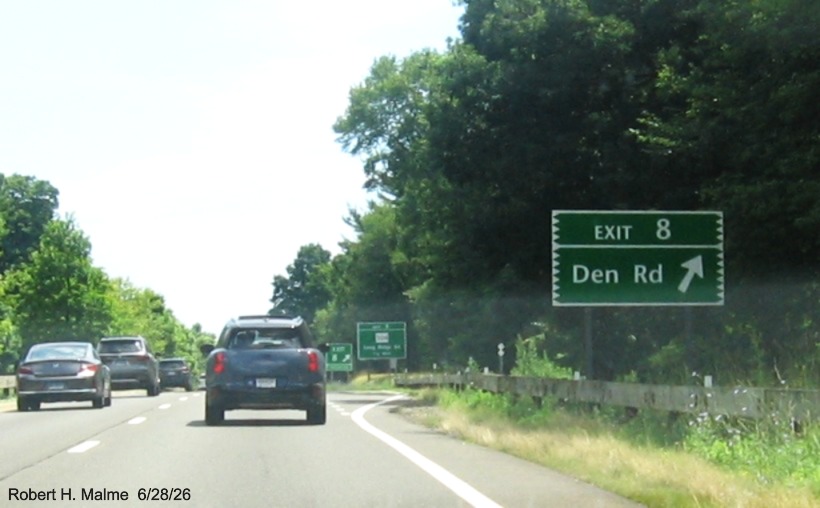 Image of ground mounted ramp sign for the Den Road exit, now with new milepost based number 
 on CT 15 North/Merritt Parkway in Stamford