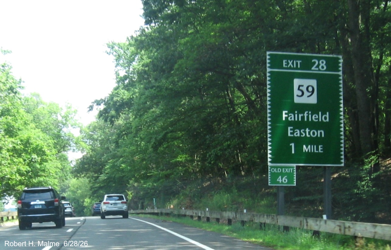 Image of 1 mile advance sign for the CT 59 exit, with new milepost based exit 
 number and Old Exit 46 sign on support post on CT 15 North/Merritt Parkway in Fairfield, June 2026