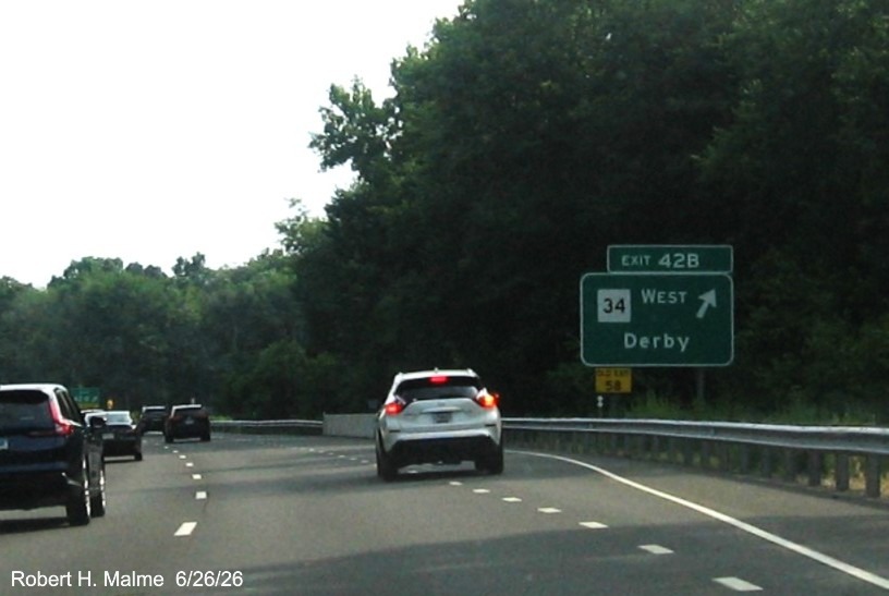 Image of new ground mounted ramp sign for the CT 34 exit, with new milepost based exit number on 
 CT 15 South/Cross Parkway in Derby, June 2026