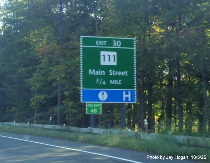 Image of 3/4 Mile advance sign for the CT 111/Main Street exit, with new milepost based exit 
 number and Old Exit 48 sign on support post on CT 15 North/Merritt Parkway in Bridgeport, by Jay Hogan, October 2025