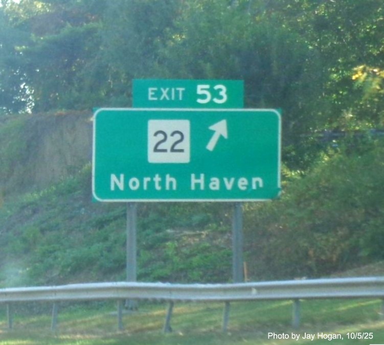 Image of ground mounted 1 Mile advance sign for the CT 22 exit, with new milepost 
 based exit number on CT 15 North/Cross Parkway in North Haven, by Jay Hogan, August 2025