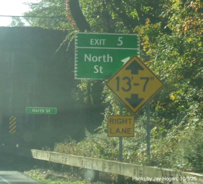 Image of exit sign for the North Street exit, with new milepost based number 
 on CT 15 North/Merritt Parkway in Stamford