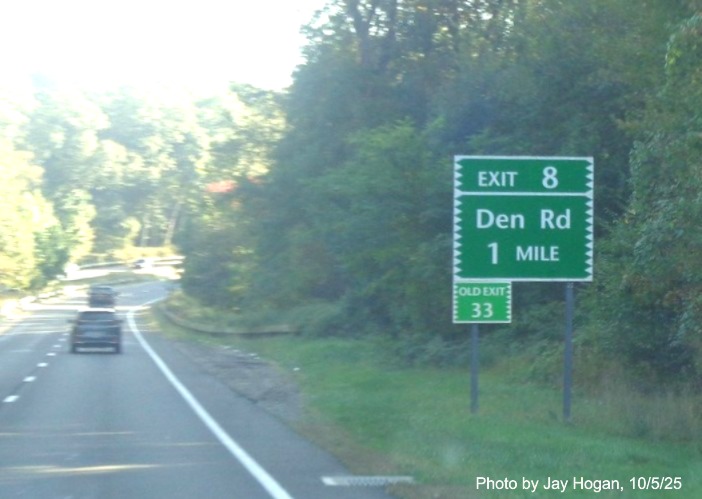 Image of 1 Mile advance sign for the Den Road exit, with new milepost based number 
 on CT 15 North/Merritt Parkway in Stamford