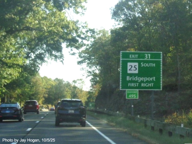 Image of 1/2 Mile advance sign for the CT 25 South exit, with new milepost based exit 
 number and Old Exit 49S sign on support post on CT 15 North/Merritt Parkway in Bridgeport, by Jay Hogan, October 2025