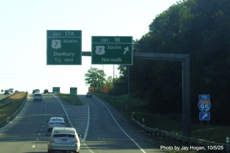 Image of overhead signs at US 7 South exit ramp, now with 2 different new milepost based 
 exit numbers on CT 15 North/Merritt Parkway in Norwalk