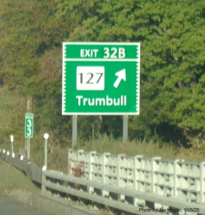 Image of ground mounted exit sign for the CT 127 exit, with new milepost 
 based exit number on CT 15 South/Merritt Parkway in Trumbull, by Jay Hogan, October 2025
