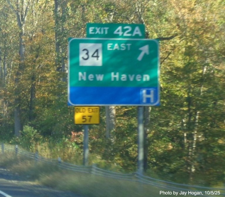 Image of ground mounted ramp sign for the CT 34 East exit, with new milepost 
 based exit numbers and yellow Old Exit 57 sign on CT 15 North/Cross Parkway in Derby, by Jay Hogan, October 2025