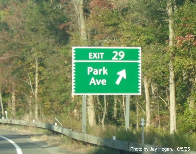 Image of ground mounted ramp sign for the Park Avenue exit, with new milepost based exit 
 number and Old Exit 47 sign on support post on CT 15 North/Merritt Parkway in Fairfield, by Jay Hogan, October 2025