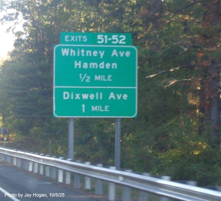 Image of ground mounted 1 Mile advance sign for the Whitney Avenue exit, with new milepost 
 based exit number and Old Exit 61 sign on support on CT 15 North/Cross Parkway in Hamden, by Jay Hogan, October 2025