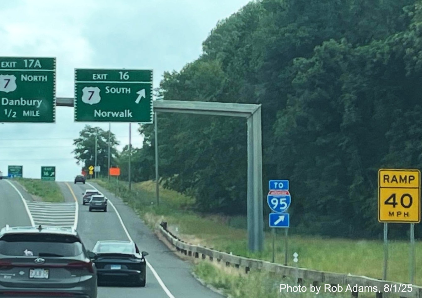 Image of overhead signs at US 7 South exit ramp, now with 2 different new milepost based 
 exit numbers on CT 15 North/Merritt Parkway in Norwalk