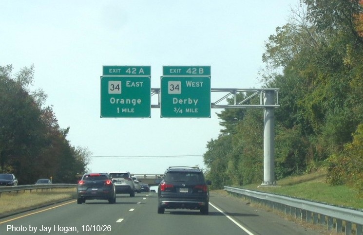 Image of mew 1 and 1/2 mile overhead advance signs for the CT 34 exit, placed in the fall
 of 2026 on CT 15 South/Cross Parkway in Derby, by Jay Hogan, October 2026