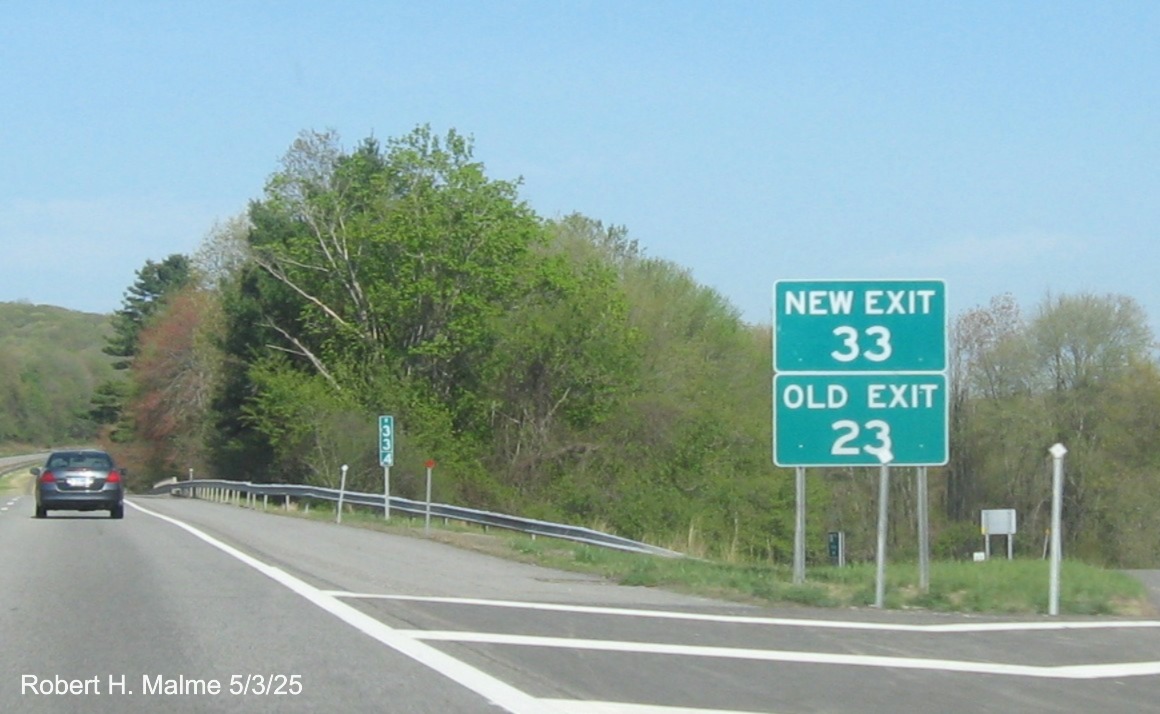 Image of ground mounted New Exit 33/Old Exit 23 sign for CT 163 exit on CT 2 West in 
	   Bozrah, May 2025