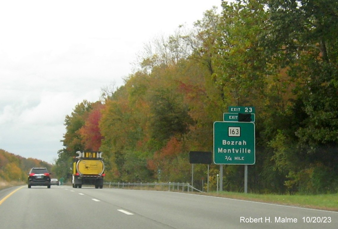 Image of new 3/4 mile advance sign for CT 163 exit on CT 2 West on CT 32 in Bazrah with covered 
      over future exit number (33) and also Old Exit 23 sign, October 2023