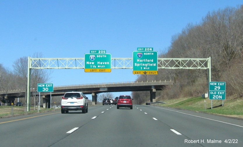 Image of recently placed New and Old Exit number ground mounted signs put up for I-91 exit on CT 9 North in Middletown, April 2022