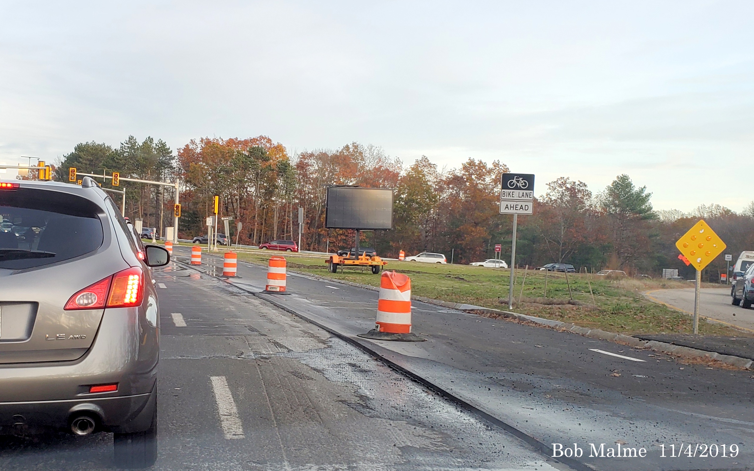 Image of final paving operations underway on Derby Street by MA 3 South ramps in early Nov. 2019