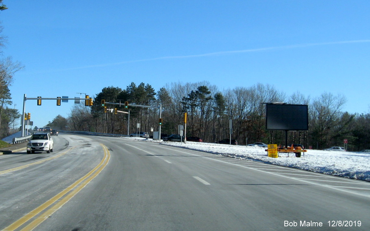 Image of traffic backed up onto ramp from MA 3 South to Derby Street headed east due to no turn on red sign in Dec. 2019