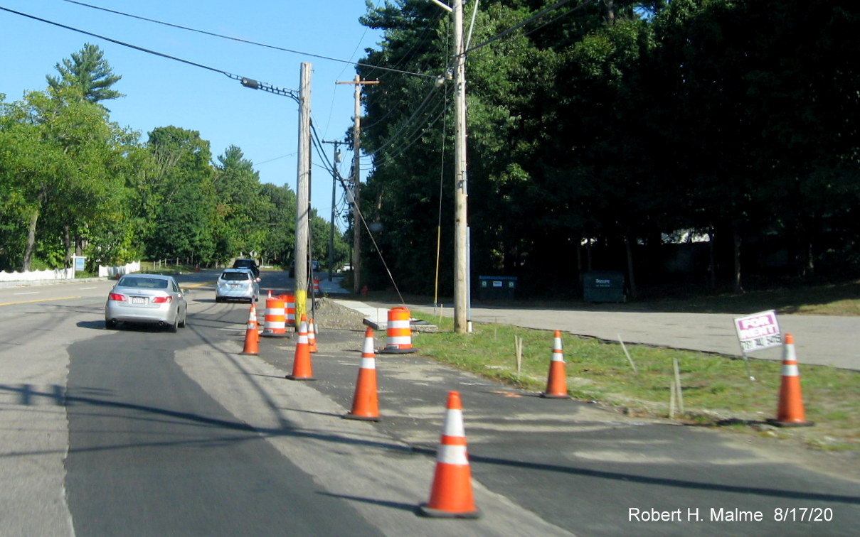 Image of remaining utility pole in Whiting Street (MA 53) widened right-of-way preventing completion of roadwork, August 2020