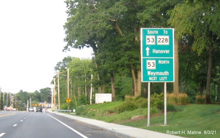 Image of first of 2 new style MassDOT guide signs for upcoming intersection with Whiting Street (MA 53) on Derby Street headed east in Hingham, August 2021