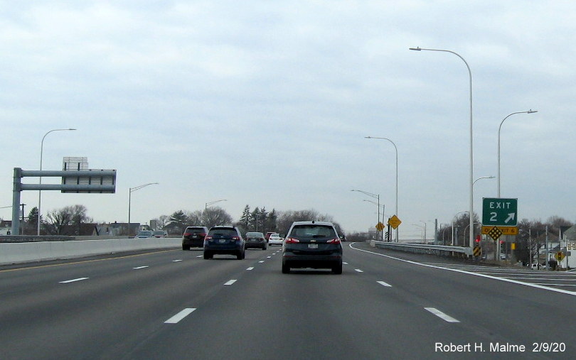 Image of new milepost exit gore sign for To RI 102/US 44 exit with yellow old exit tab below on I-195 West in East Providence