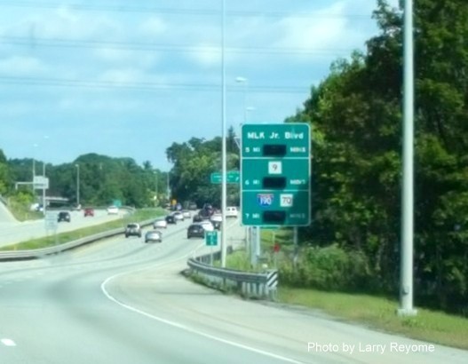 Image of real travel time sign on I-290 East in Auburn, photo by Larry Reyone