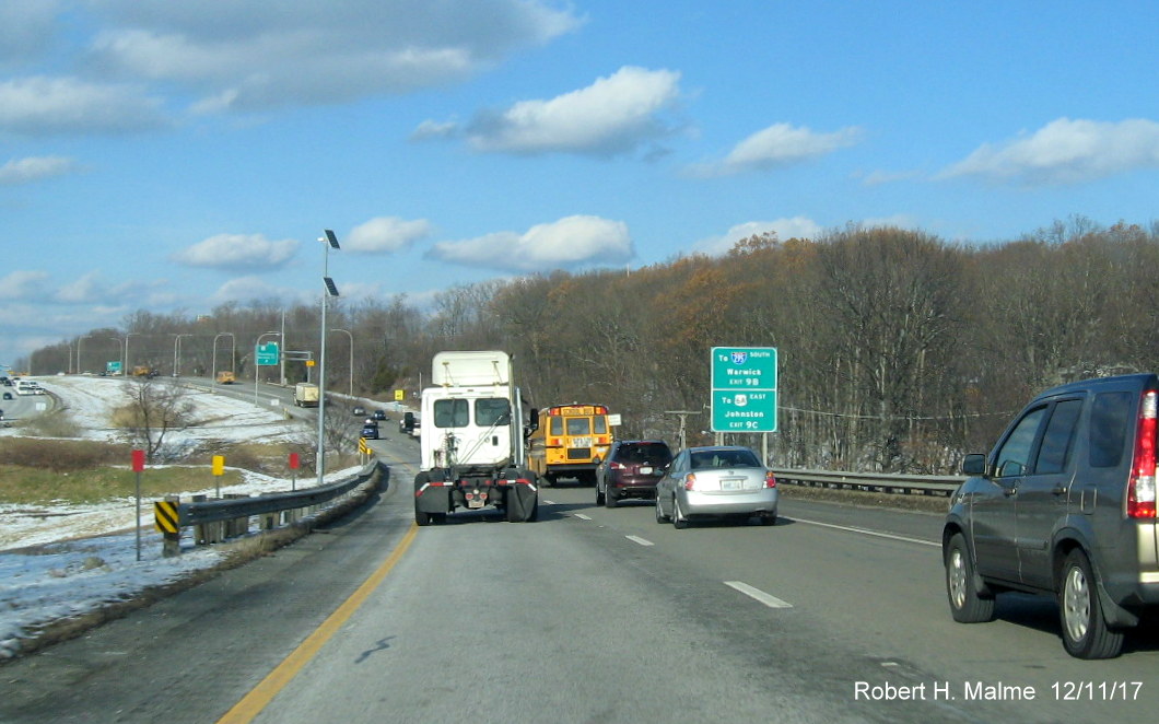 Image of auxiliary signage for US 6 exit on I-295 North in Johnston, RI with new exit numbers