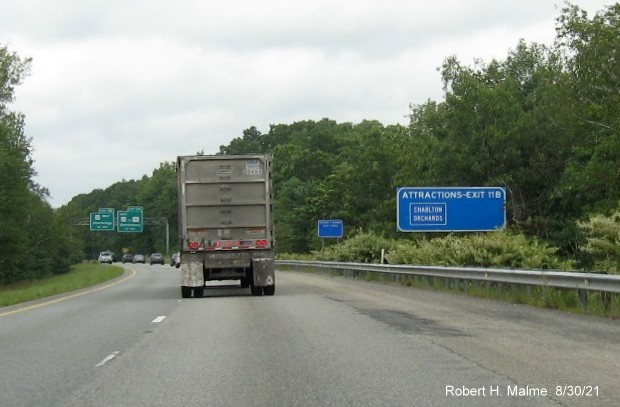 Image of blue Attractions sign for US 20 West exit with new milepost based exit number on I-395 North in Auburn, August 2021